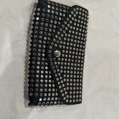Studded black leather clutch