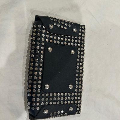 Studded black leather clutch