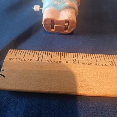 VINTAGE KEWPIE DOLL POWDER DISPENSER AND WIND-UP BABY