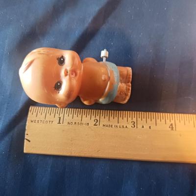 VINTAGE KEWPIE DOLL POWDER DISPENSER AND WIND-UP BABY