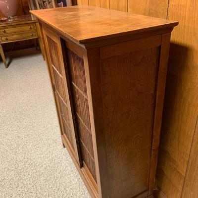 wood cabinet with sliding doors