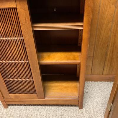 wood cabinet with sliding doors