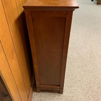 wood cabinet with sliding doors