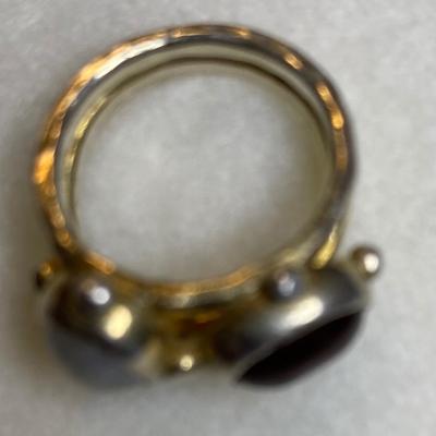 Sterling silver ring with two cabachons. Size 6
