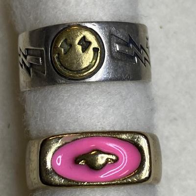 Smiley face and planet rings. Both size 6.5