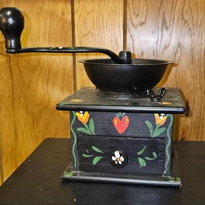 Antique coffee grinder with folk art hearts and flowers