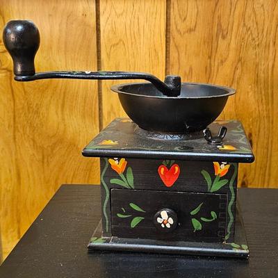 Antique coffee grinder with folk art hearts and flowers