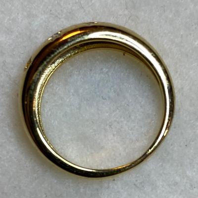 Goldtone dome ring with seven tiny CZ’s. Size 5.75
