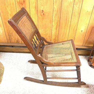 Antique caned rocking chair
