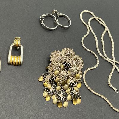 Vintage Pendent, clip earrings, hoop earrings are marked Lewis Segal