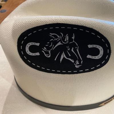 White hat black trim/horses. Size medium