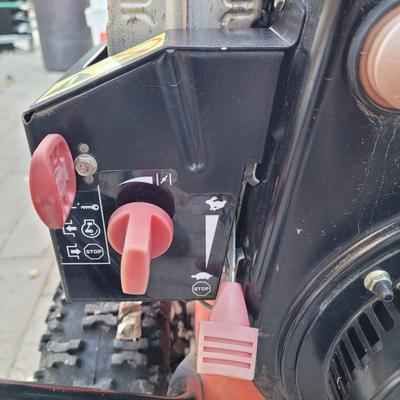 Ariens 824 snowblower. Ran when parked complete