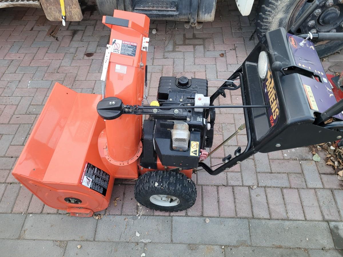 Ariens 824 snowblower. Ran when parked complete