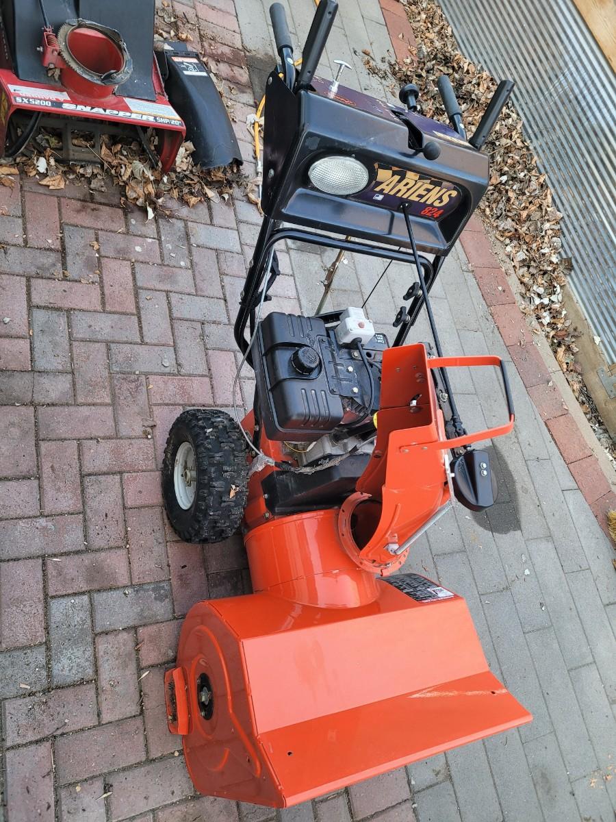 Ariens 824 snowblower. Ran when parked complete