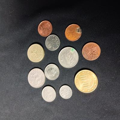 A COLLECTION OF FOREIGN COINS (3)
