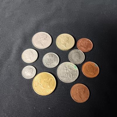 A COLLECTION OF FOREIGN COINS (3)