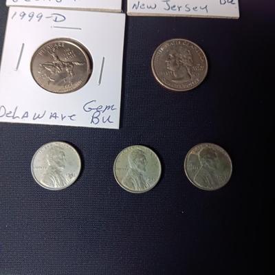 5 UNCIRCULATED STATE QUARTERS, 1 STATE QUARTER AND 3 - 1943 PENNIES