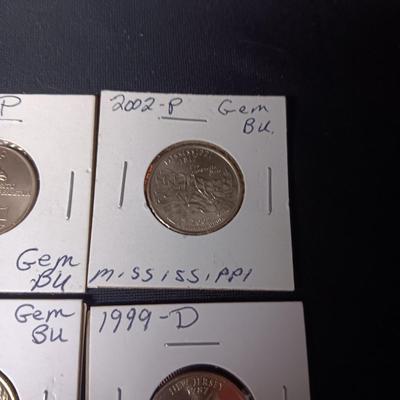 5 UNCIRCULATED STATE QUARTERS, 1 STATE QUARTER AND 3 - 1943 PENNIES