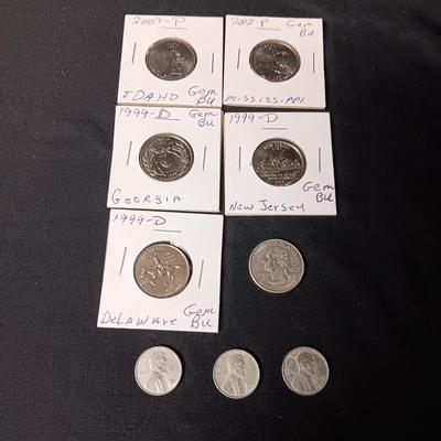 5 UNCIRCULATED STATE QUARTERS, 1 STATE QUARTER AND 3 - 1943 PENNIES