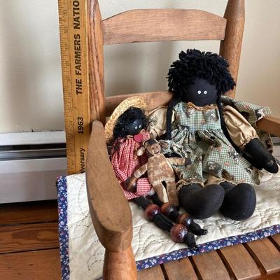 LOT 34: Vintage Children's Wooden Rocking Chair with Black Americana Folk Art Dolls