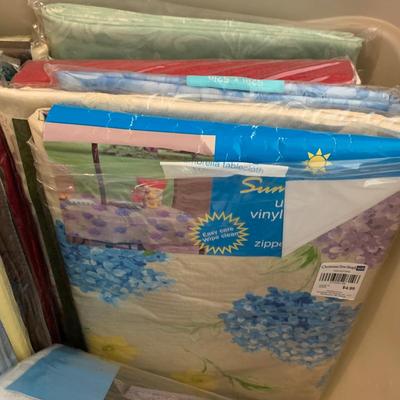 LOT 60: Assorted New in Package Tablecloths and More
