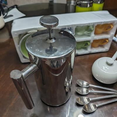 Sterling silver French press, sterling silver (4)spoons, sugar bowl with spoon, kids or espresso cup and saucer set