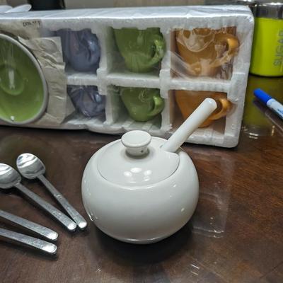 Sterling silver French press, sterling silver (4)spoons, sugar bowl with spoon, kids or espresso cup and saucer set