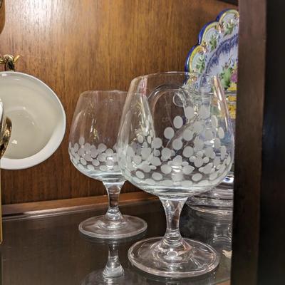 Pair of etched crystal balloon wine glasses