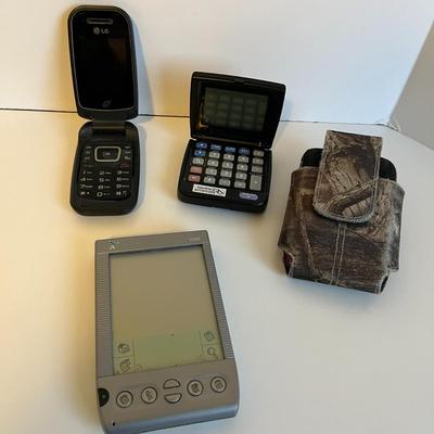 Visor Organizer, LG Flip Phone with Belt Case, and Calculator Alarm