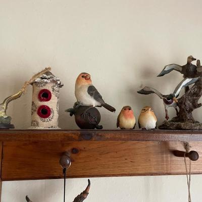 Wood shelf with bird decor