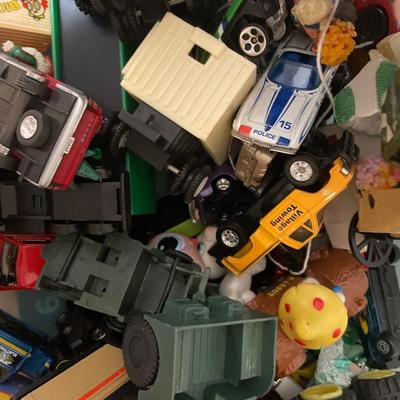 Tote of cars and other miscellaneous toys
