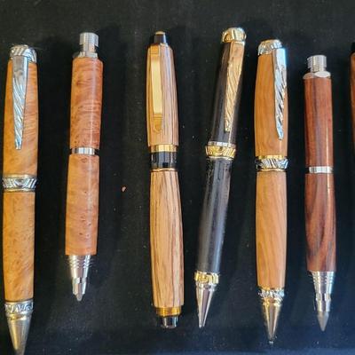 LOT OF 24 HAND CRAFTED/CARVED WOOD PENS WITH CASE