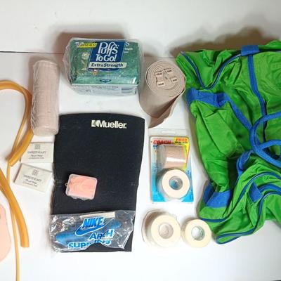 Duffle bag with medical supplies - Knee brace - wraps - tape and more