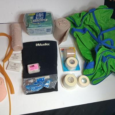 Duffle bag with medical supplies - Knee brace - wraps - tape and more