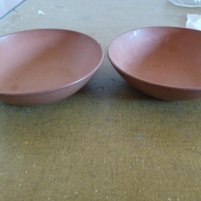 2 brown melamine bowls