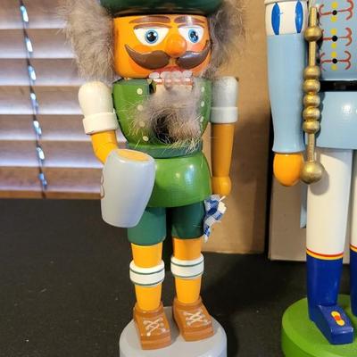 LOT 22 - 6 HAND CARVED WOOD NUTCRACKERS