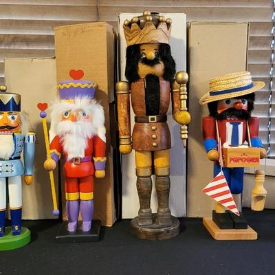 LOT 22 - 6 HAND CARVED WOOD NUTCRACKERS