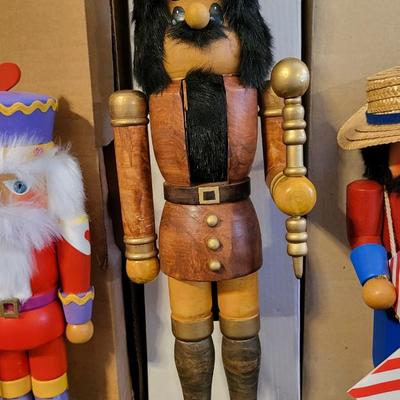 LOT 22 - 6 HAND CARVED WOOD NUTCRACKERS
