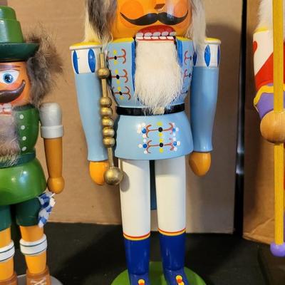 LOT 22 - 6 HAND CARVED WOOD NUTCRACKERS