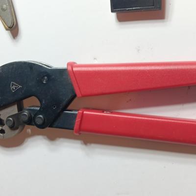 Cable Pliers - Cutters and a red Pro series 25-foot tape measure