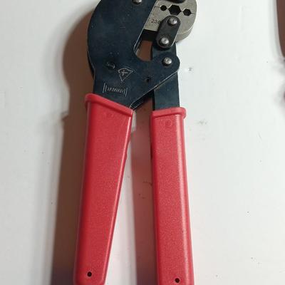 Cable Pliers - Cutters and a red Pro series 25-foot tape measure