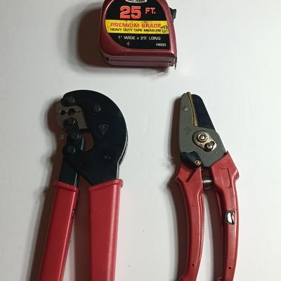 Cable Pliers - Cutters and a red Pro series 25-foot tape measure