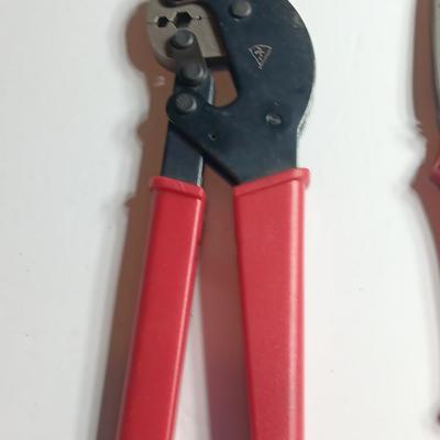 Cable Pliers - Cutters and a red Pro series 25-foot tape measure