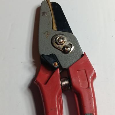 Cable Pliers - Cutters and a red Pro series 25-foot tape measure