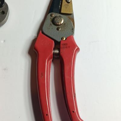 Cable Pliers - Cutters and a red Pro series 25-foot tape measure
