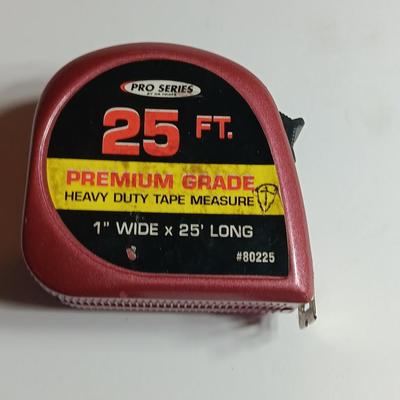 Cable Pliers - Cutters and a red Pro series 25-foot tape measure