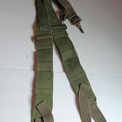 Military issued canteen with suspenders and ammunition bag