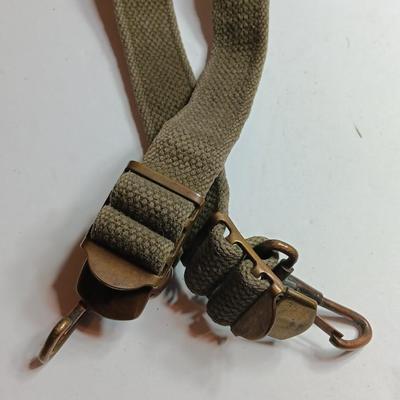 Military issued canteen with suspenders and ammunition bag