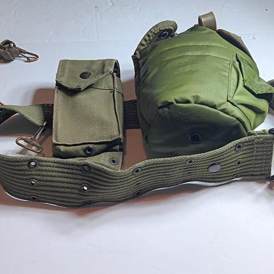 Military issued canteen with suspenders and ammunition bag