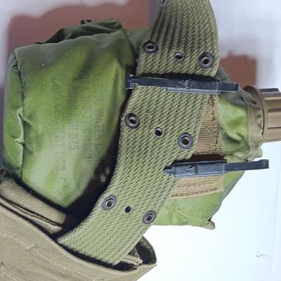 Military issued canteen with suspenders and ammunition bag